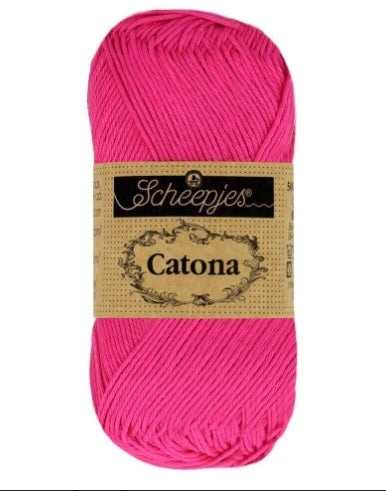 Close-up of Scheepjes Catona 50g cotton showing the smooth, fuzz-free texture and vibrant Ginger Gold Color tone for high-definition stitch work