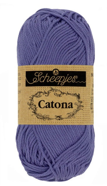 Close-up of Scheepjes Catona 50g cotton showing the smooth, fuzz-free texture and vibrant Deep Amethyst tone for high-definition stitch work