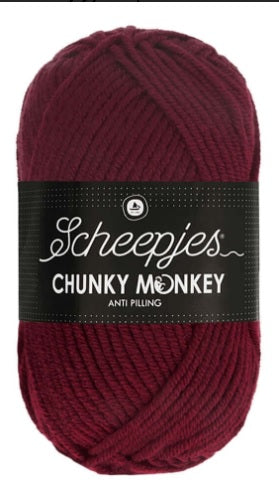 Extreme close-up of the Chunky Monkey yarn strands, highlighting the high-quality anti-pilling acrylic fibers that ensure a smooth, fuzz-free finish for long-wearing garments in Maroon colour