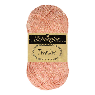 A ball of Scheepjes Twinkle sparkling yarn; the ideal choice for handmade Christmas ornaments, glittery coasters, and elegant evening shawls
