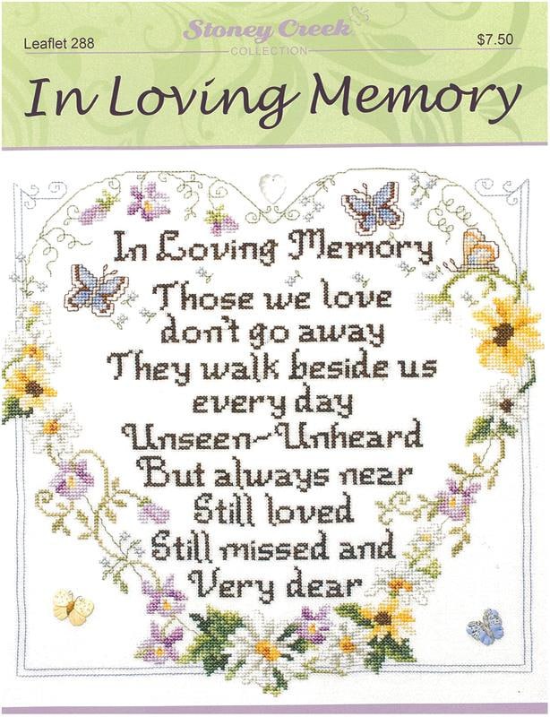 A professional-grade cross-stitch chart by Stoney Creek titled 'In Loving Memory.' The high-definition design features a soulful memorial verse surrounded by an artisanal floral and vine border. The sentiment reads: 'Those we love don't go away, they walk beside us every day. Unseen and unheard but always near, still loved, still missed, and very dear.'
