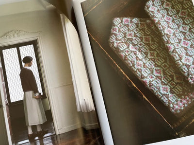 A spread showing a stunning full-sized Fair Isle sweater and matching mittens from the Shimada collection