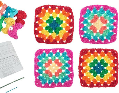 A close-up of a first-time crafter using the Trimits 'My First' Crochet Kit to stitch a vibrant pink and blue granny square, showing the chunky, easy-to-handle yarn