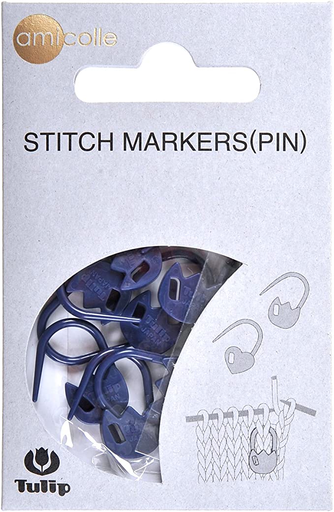 A pack of 7 premium Tulip stitch markers from Japan, available in Dark Navy Tulip flower shapes. The markers feature a secure, clip-on design with a smooth finish to prevent snagging on yarn. They come in soft, vibrant colors and are displayed in their original Tulip Japan packaging, perfect for marking rows on sweaters and tops.
