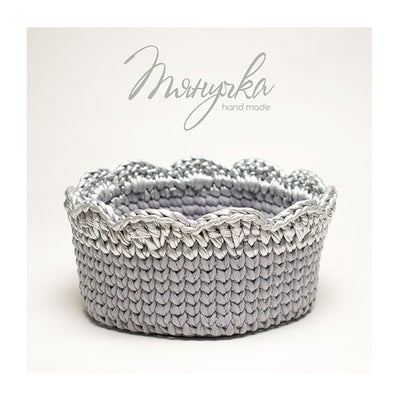 A structural 15cm crochet basket made with Tyanuchka metallic yarn, demonstrating how the yarn holds its shape perfectly.