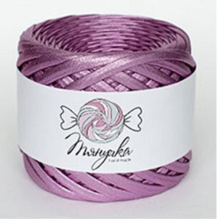 "A roll of Tyanuchka Metallic Yarn in a shimmering silver finish, showing its flat, ribbon-like structure and high-gloss texture in purple colour