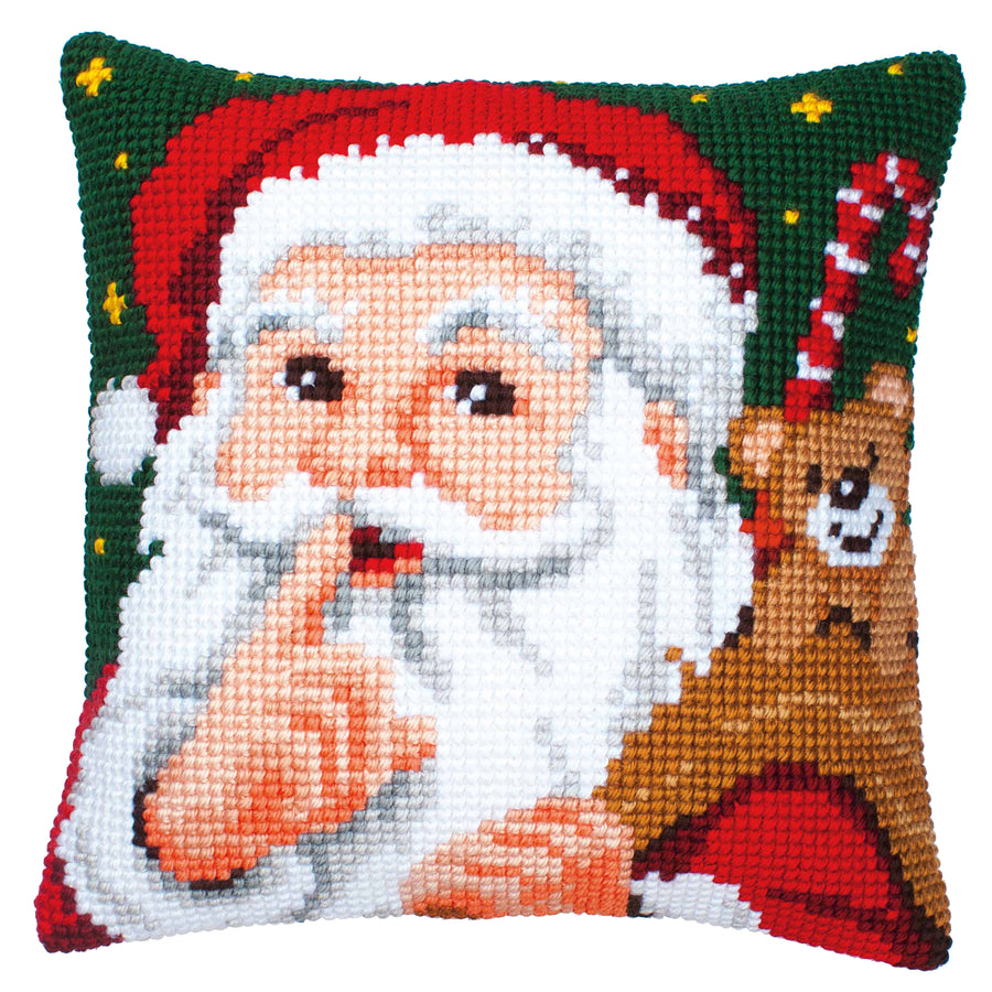 Contents of a Vervaco Santa tapestry kit: includes thick 100% acrylic yarn, a specialty needle, and a color-printed canvas for a chunky, textured holiday finish
