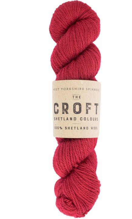 Close-up of WYS The Croft Aran wool in Reawick, showing the unique multi-tonal flecks and soft, sturdy handle of authentic Shetland fiber