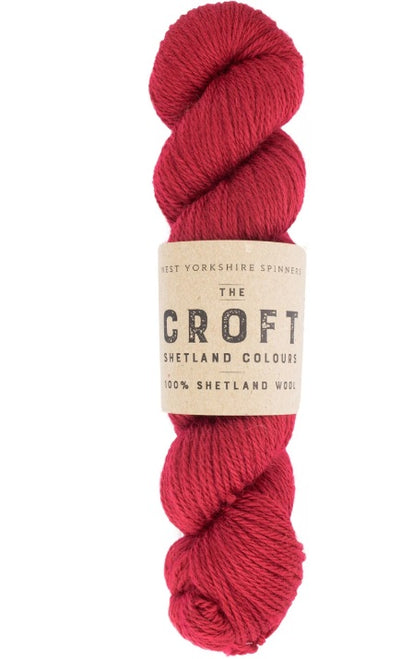 Close-up of WYS The Croft Aran wool in Reawick, showing the unique multi-tonal flecks and soft, sturdy handle of authentic Shetland fiber