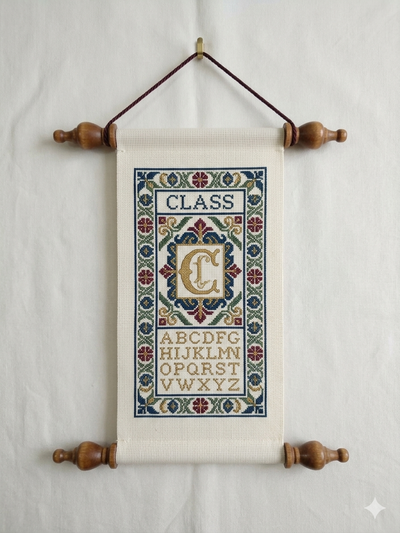 Packaging for Classical Birch Bellpulls, displaying the product on a red background with Christmas-themed graphics.

A set of top and bottom Classical Birch Bellpull hangers, showing the rich walnut stain and smooth varnished finish of the solid wood