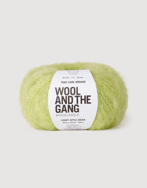Close-up of Take Care Mohair fibers, highlighting the 'diamond' sheen of the South African Kid Mohair and the plush brushed appearance in candy apple green colour.