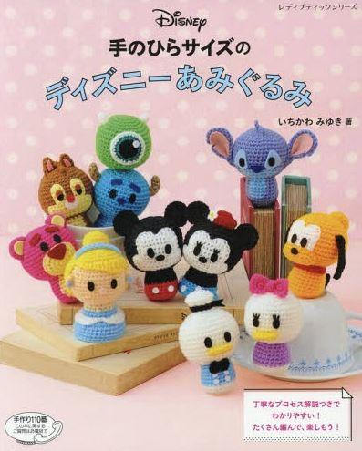 Collection of crocheted Disney characters. Made in Japan Book
Front cover of the Tsum Tsum Amigurumi Book featuring a tall stack of colorful, pill-shaped crochet characters