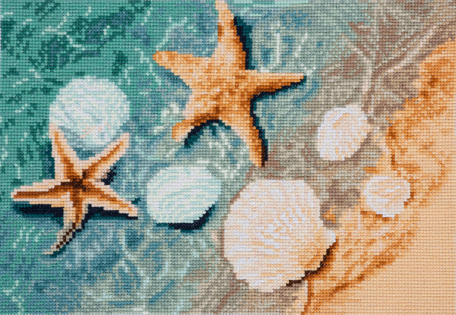 Cross-stitched design of starfish and shells on a textured fabric background