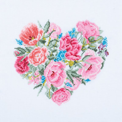 Cross stitch kit image showing a heart-shaped design with a floral pattern in pink, blue, and green colors on a white background.