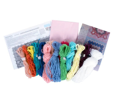Set of colorful embroidery threads with patterns on a white background.
Pre-printed tapestry kits Singapore, easy cross stitch cushions, chunky yarn embroidery, zippered cushion kits, hobby kits for adults.