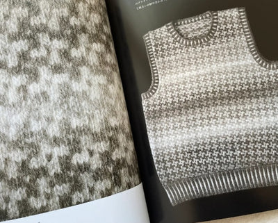 A close-up of a high-definition color-work chart from Eclogue, showing the intricate geometric Fair Isle layout
