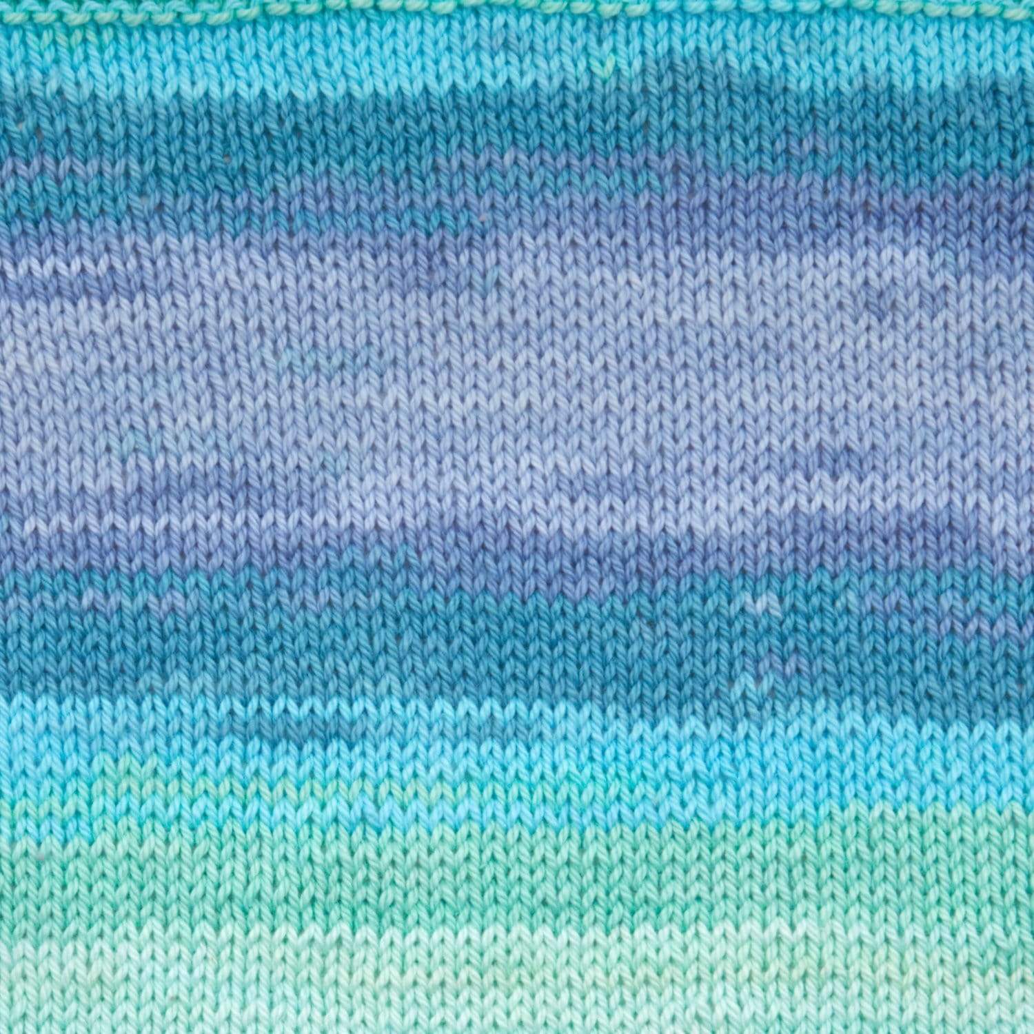 Close-up of blue and green striped fabric texture knitted using PREMIER Hipster®  100% cotton yarn. 4mm knitting needle. Suitable for Singapore weather