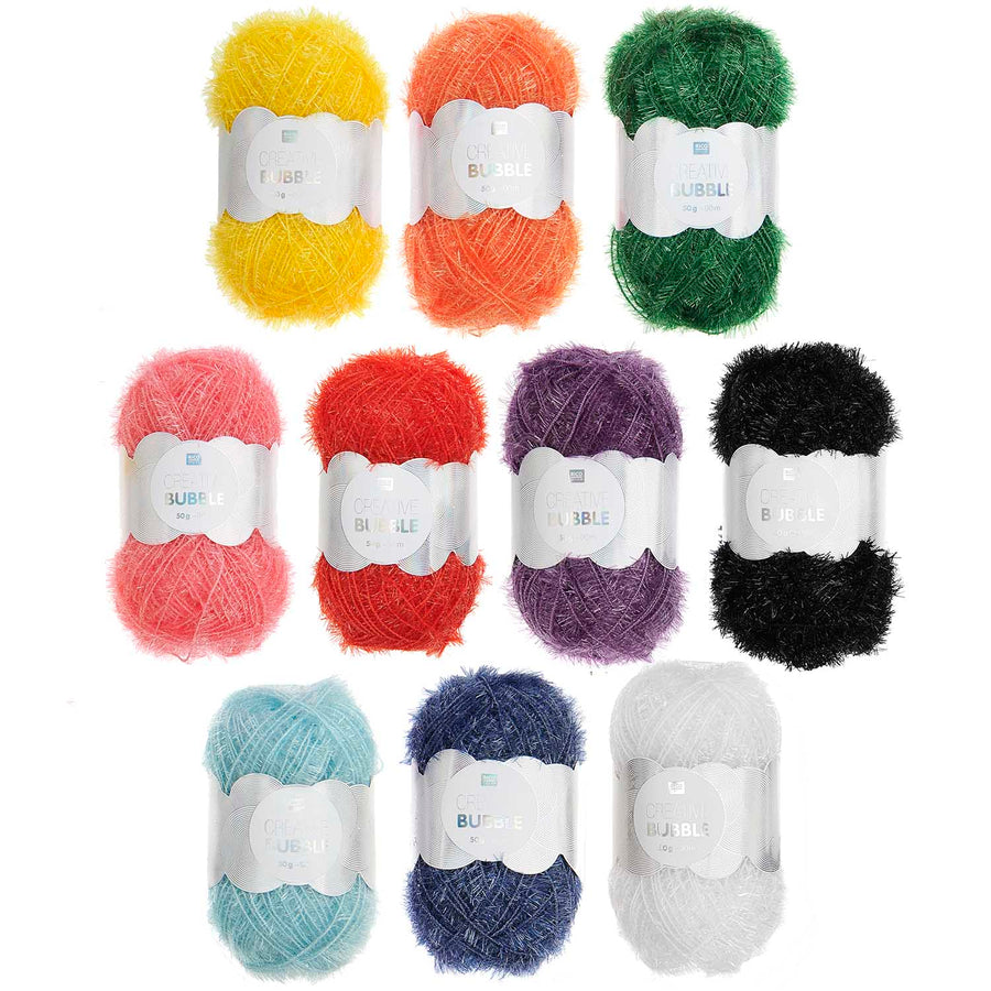 Rico Creative Bubble yarn in vibrant rainbow colors; a textured polyester scrubby yarn for crocheting fun and functional kitchen sponges.