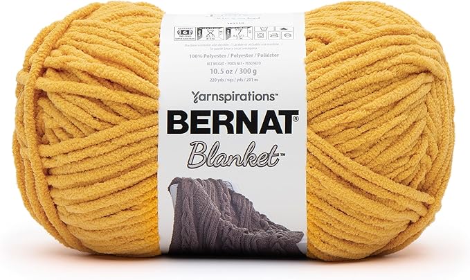 Ball of yellow mustard yarn with a Bernat Blanket label for sale. Chunky size knitting or crocheting.