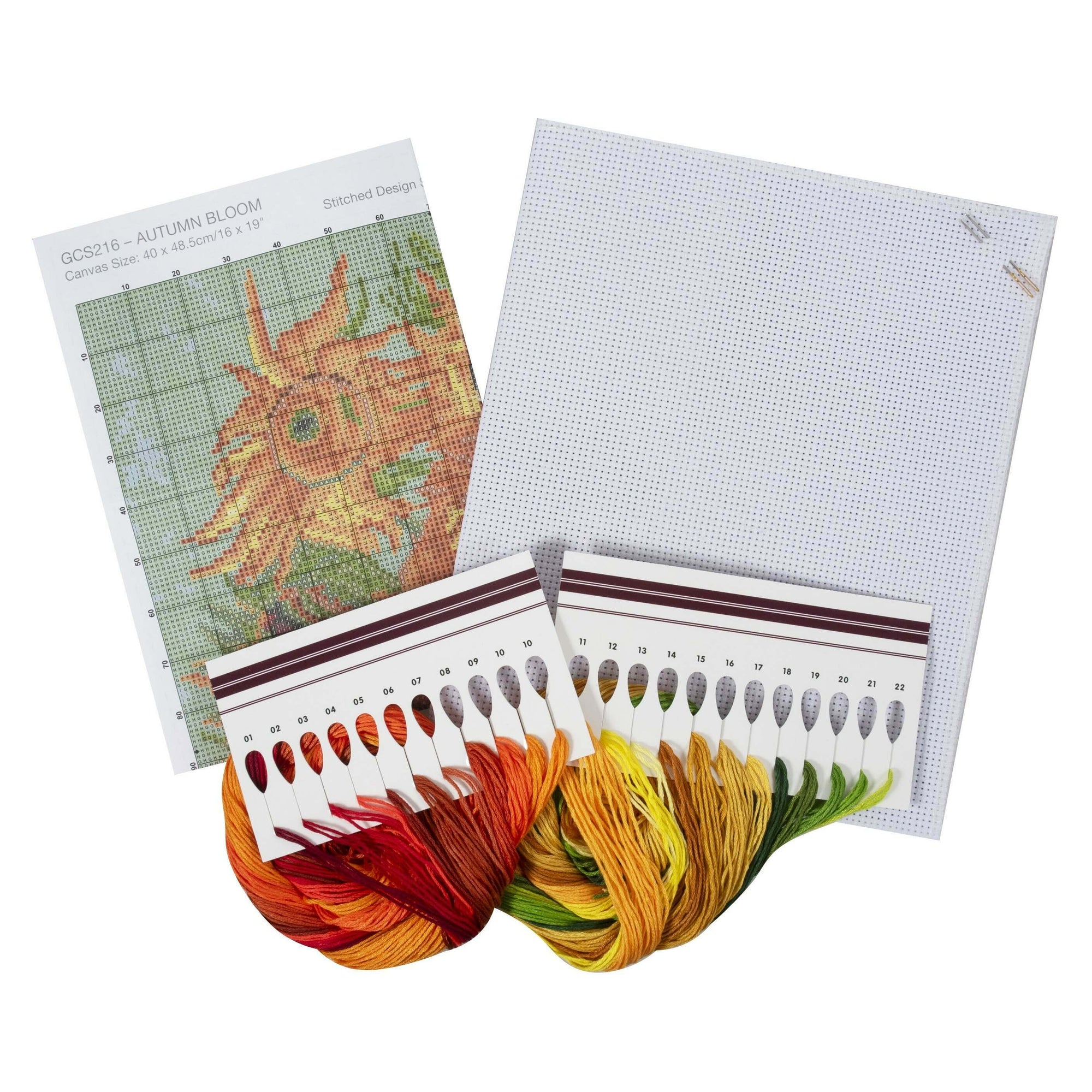 Cross-stitch kit with pattern, fabric, and color swatches on a white background