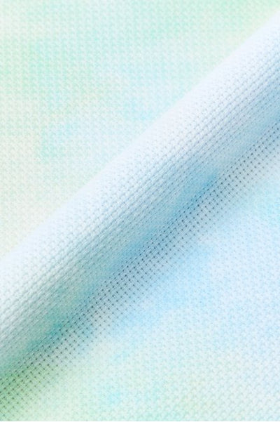 High-quality 14-count Aida cloth for cross-stitch and embroidery. The image features a close-up of the distinct, even-weave squares that make counting stitches simple and precise. The fabric is shown with a professional, firm finish, ideal for all needlework projects