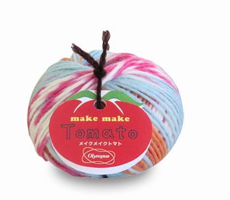 A ball of multicolored Olympus Tomato Yarn with a label attached, displaying the brand and product name.