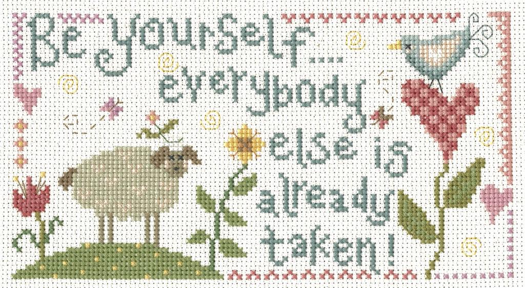 The "Be Yourself" cross stitch kit, featuring a colorful floral  and inspirational quote, including premium embroidery threads, fabric, and a needle