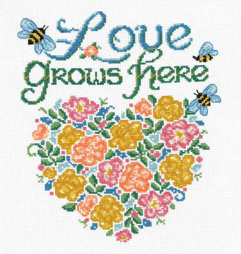 An Ursula Michael cross-stitch kit titled 'Bee-Loved.' The design is a colorful sampler featuring the text 'Love Grows Here' surrounded by intricate flowers and honeybees. The kit includes 14-count Aida fabric, a clear pattern chart, a tapestry needle, and full skeins of genuine DMC embroidery threads for a 141W by 121H stitch count project."