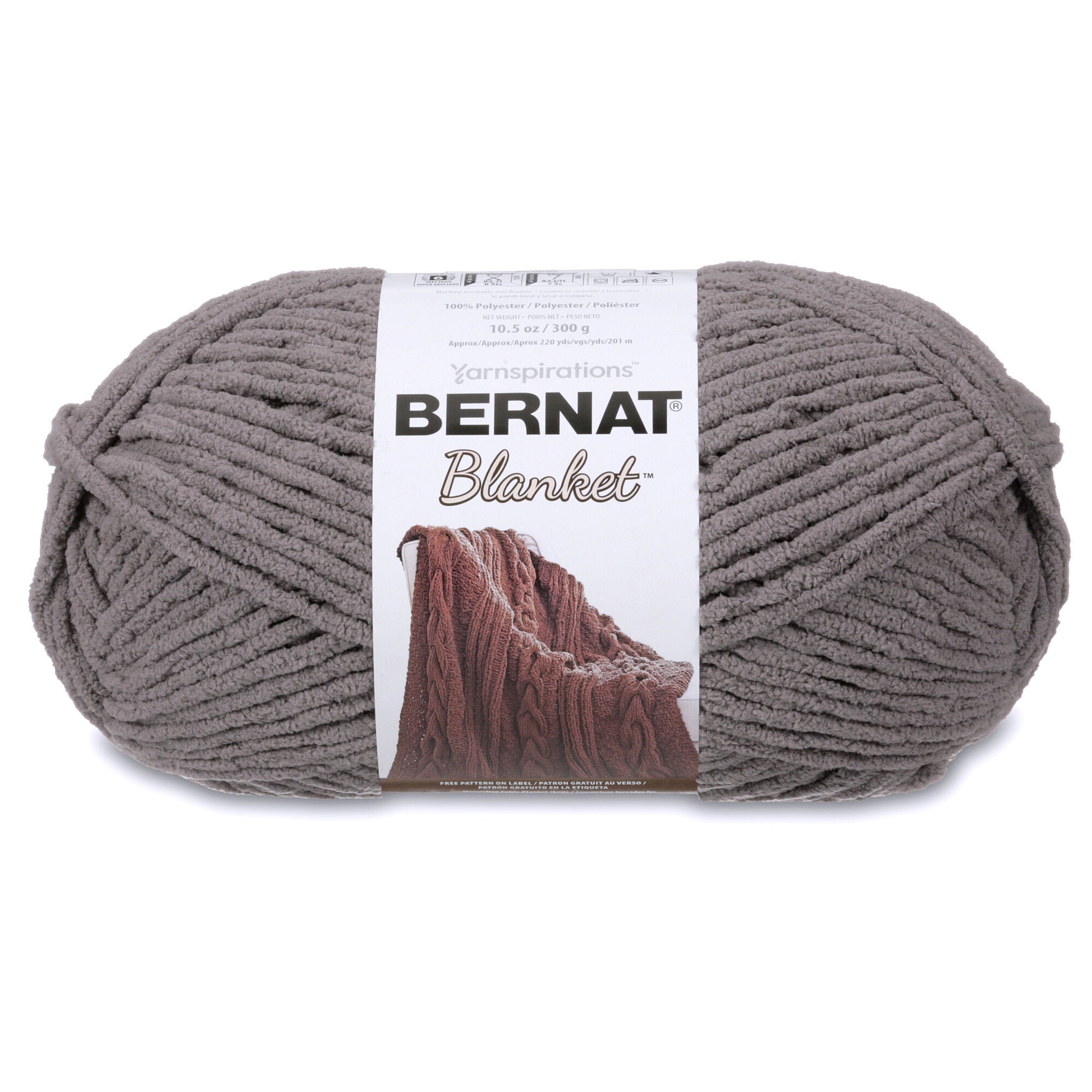 Close-up of Bernat Blanket yarn showing the plush velvety texture; a hypoallergenic and machine-washable yarn ideal for baby blankets and home decor in dark grey colours.