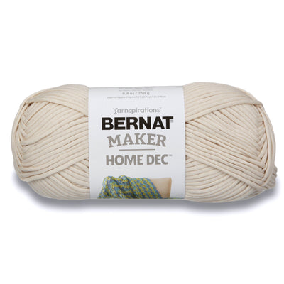 Bernat Maker Home Dec tubular yarn in Cream Color; a chunky 250g cotton-nylon blend for modern crochet baskets and home accessories