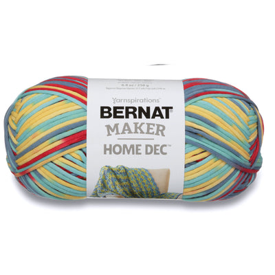 Large 250g skein of Bernat Maker Home Dec yarn; a soft and sturdy bulky weight yarn (Size 5) for quick-knit blankets and stylish rugs. Yellow, red and blue mix yarn