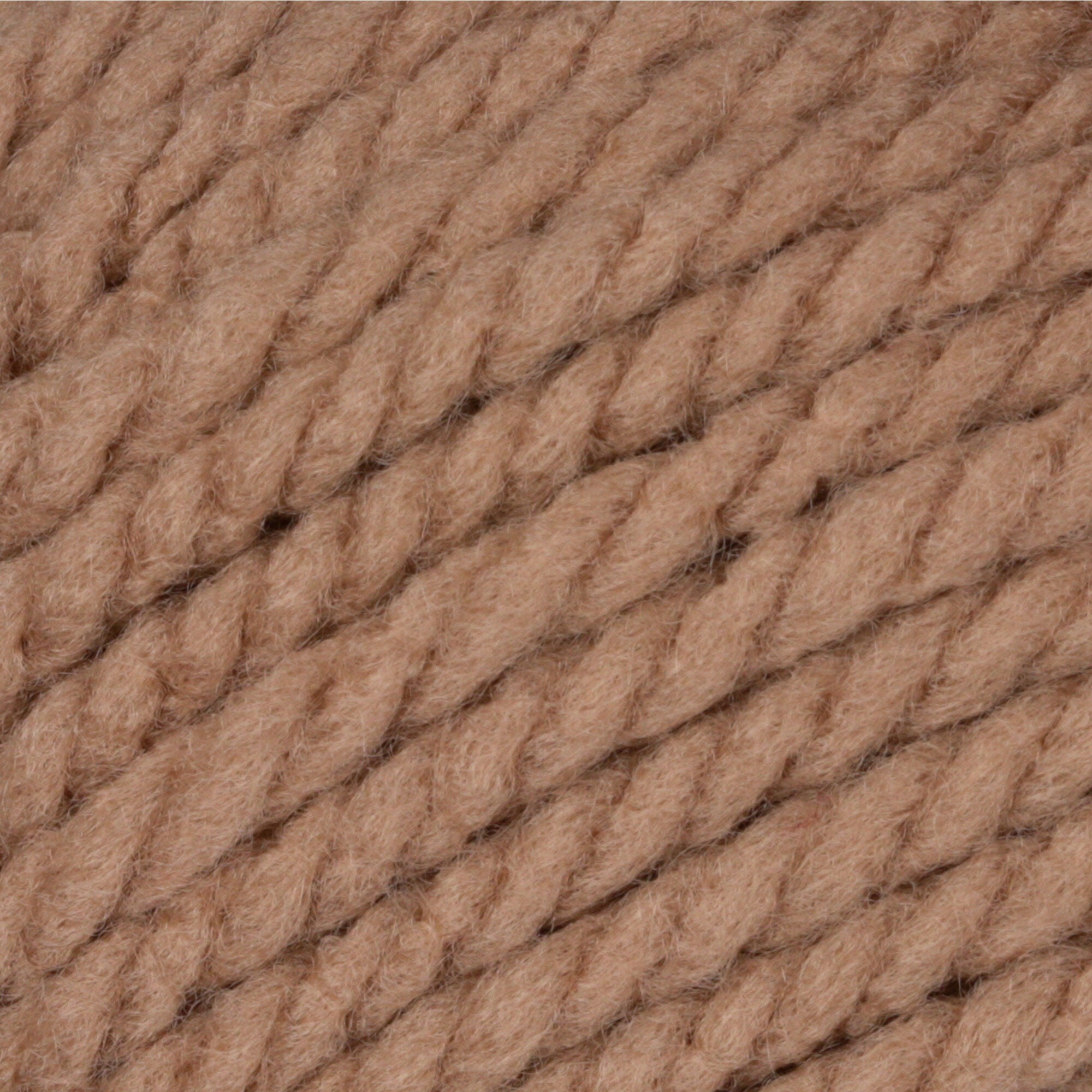 A 100g skein of Bernat Softee Chunky yarn in a vibrant solid color, showing its thick, plied structure and soft matte finish in soft taupe brown colour.