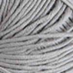Close-up of DMC Natura Just Cotton yarn, showcasing the natural, unmercerized texture and smooth finish for delicate knitting and crochet in silver colour