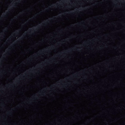 Soft Premier Parfait Chunky yarn in a large skein, showing the thick, velvety chenille texture in black