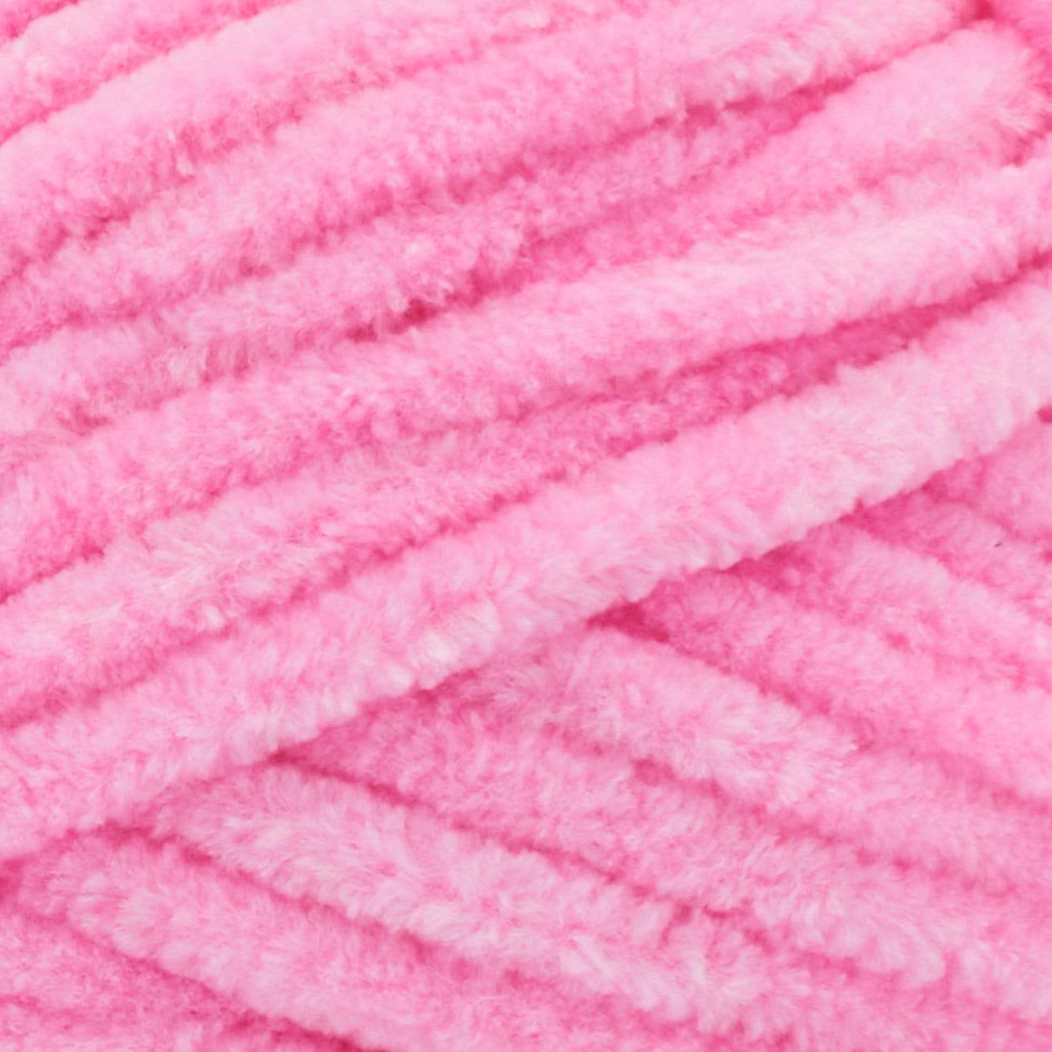 A soft, bulky weight Premier Parfait Chunky yarn perfect for making amigurumi and plush home decor in bubble gum pink