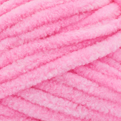 A soft, bulky weight Premier Parfait Chunky yarn perfect for making amigurumi and plush home decor in bubble gum pink