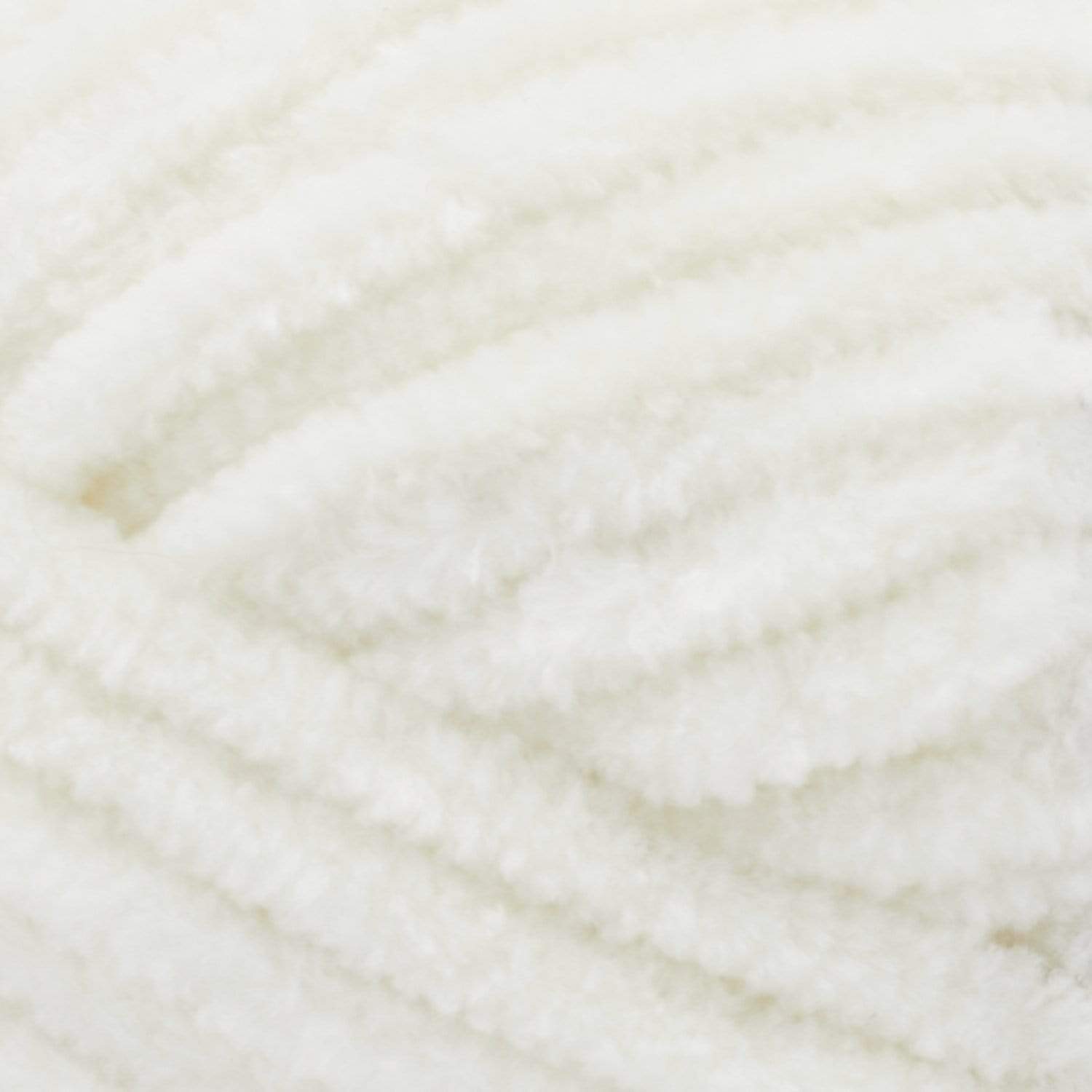 Soft Premier Parfait Chunky yarn in a large skein, showing the thick, velvety chenille texture in cream colour