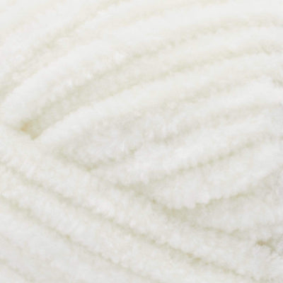 Soft Premier Parfait Chunky yarn in a large skein, showing the thick, velvety chenille texture in cream colour