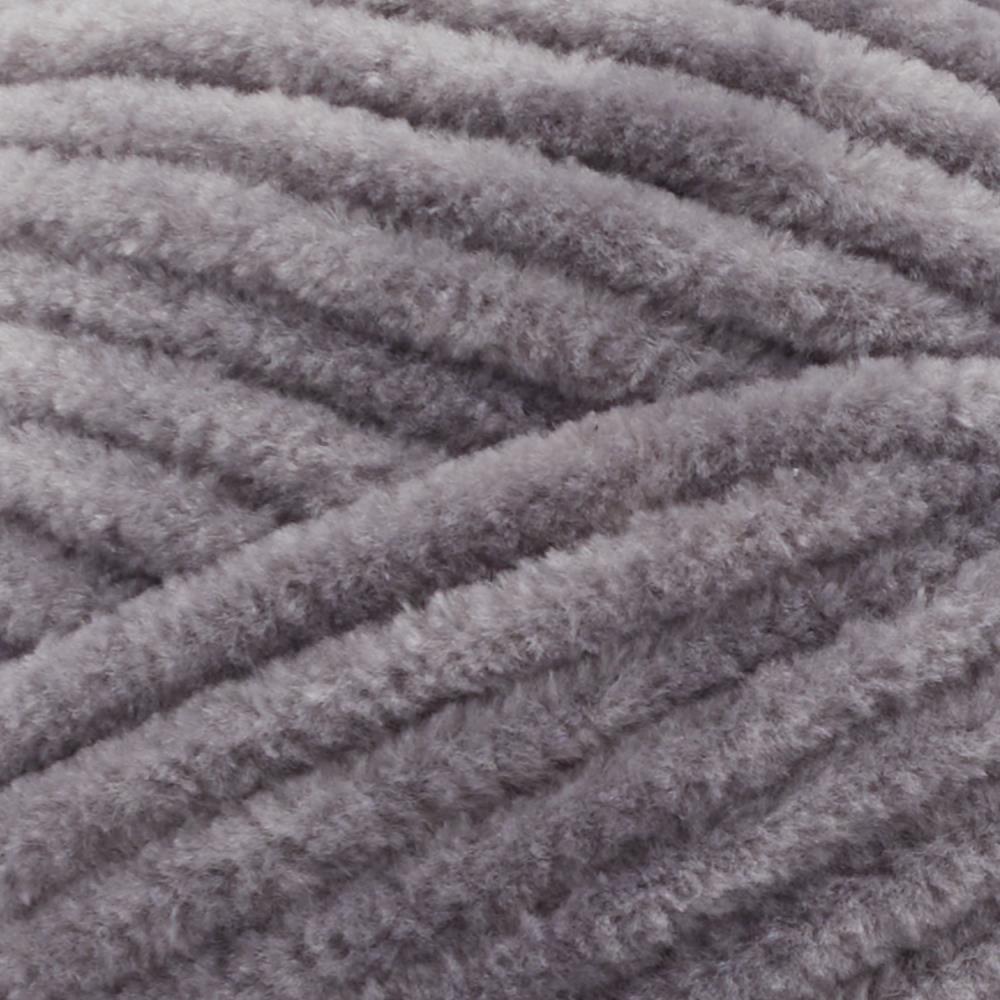 Close-up of Premier Parfait Chunky polyester yarn, highlighting the dense, plush pile and vibrant color in seal grey colour