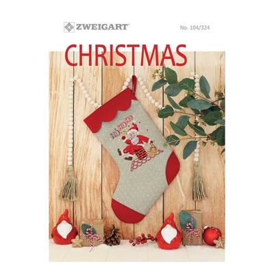 A booklet with a Christmas theme, showcasing a gray cross stitch pattern design on a red sock with Santa Claus motif, along with other Christmas-related items.