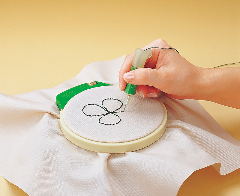 An adjustable Clover punch needle tool for embroidery, ideal for creating textured 3D effects on fabric with standard embroidery floss or fine yarns.
