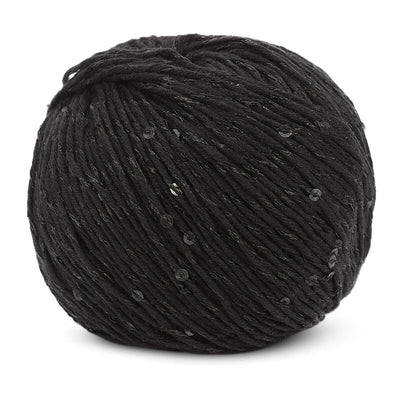 A 50g ball of DMC Natura Glam yarn, showing the beautiful twist of plain cotton thread with a matching sequined strand in black colour