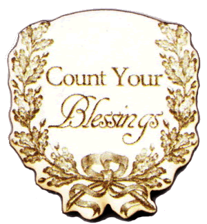 1" wide needle minder.

Put this minder on your fabric or a table and rest your needle on it while you stitch away :)