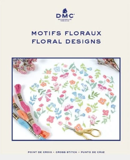 Cover of the DMC Cross Stitch Floral Designs Book featuring a floral pattern and DMC threads.