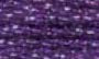 A vibrant skein of DMC Light Effects metallic floss, highlighting the way the faceted thread catches and reflects light for a luminous, jewelry-like effect in metallic dark purple