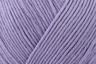 DMC Natura Just Cotton fingering weight yarn, ideal for detailed amigurumi and breathable summer garments, shown in a 50g ball in "glicine" wisteria purple lilac colour