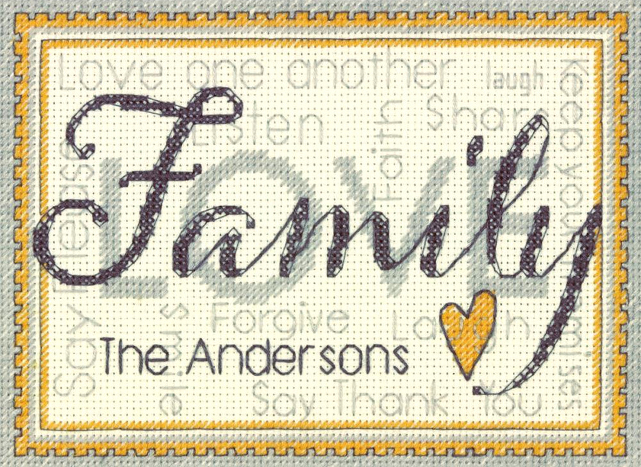 A customizable Dimensions counted cross-stitch kit featuring the word 'Family.' The background is filled with inspirational phrases like 'Love one another' and 'Laugh' in soft grey tones. The design is framed by a double light brown and grey border with an outer brown dentil pattern. The kit includes 14-count ivory Aida cloth, cotton thread, and a needle