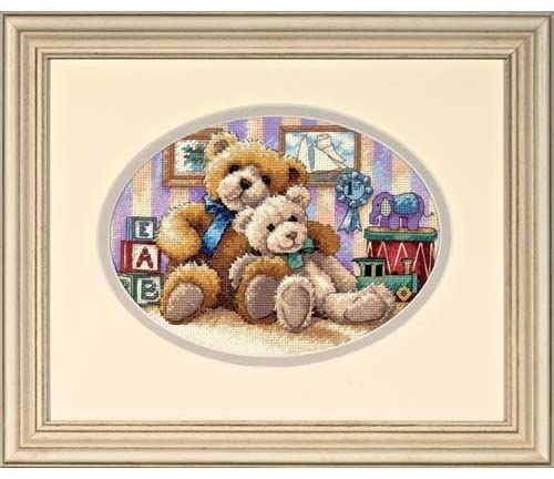An intricately detailed Dimensions Gold Collection cross-stitch kit titled 'Warm and Fuzzy.' The design features a cluster of classic teddy bears snuggled together, showcasing various fur textures and soft colors. The kit includes 18-count ivory Aida cloth, pre-sorted embroidery threads, a needle, and a pattern sheet for a 5x7 inch finished piece