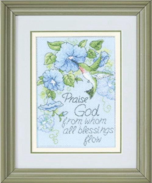 A cross stitch kit depicting a hummingbird with morning glories in a light blue background, framed in a green box.