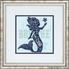 A charming Dimensions counted cross-stitch kit titled 'Mermaid Song.' The design features a colorful mermaid surrounded by bubbles, sea shells, and ocean flora. The kit includes 14-count light blue Aida fabric, pre-sorted cotton embroidery floss, a needle, and easy-to-follow instructions for a 6x6 inch square finished piece.